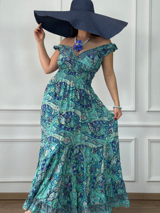 Rochie cu talie încrețită și poale cu volane