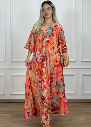 V-nyakú hosszú ruha