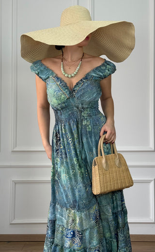 Rochie cu talie încrețită și poale cu volane